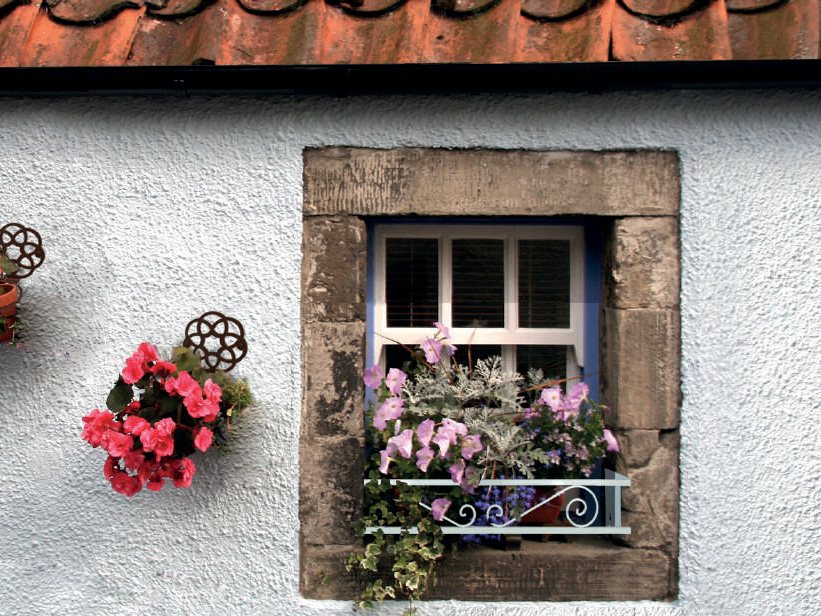 Ventana con soportes de maceta floridos de CM Garden