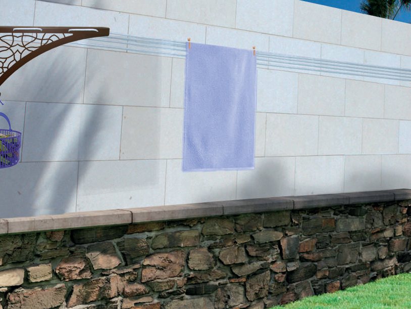Tendedero de pared CM Garden instalado en un muro exterior